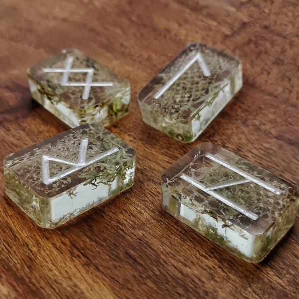 Elder futhark rune set with genuine, ethically sourced shed snake skin and reindeer lichen.